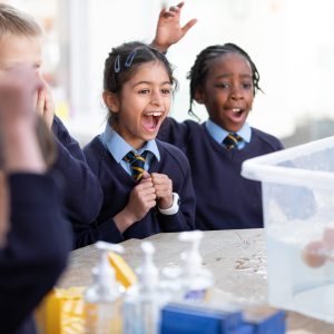 children smiling and cheering