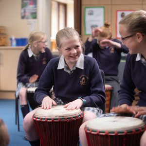 students playing the drums