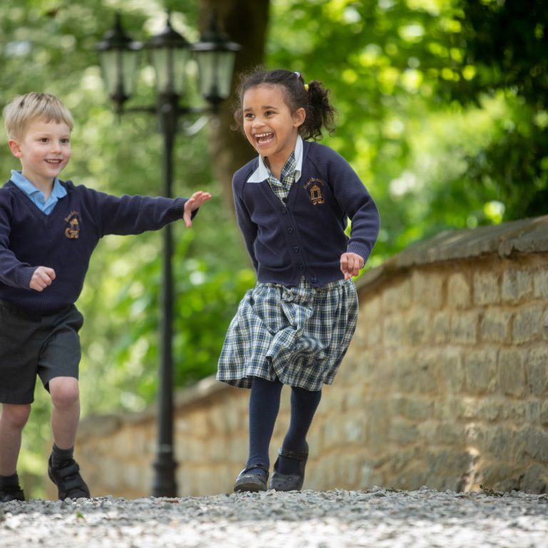 boy and girl walking outside