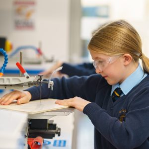 student using fine drilling machine