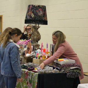 students at a craft fair