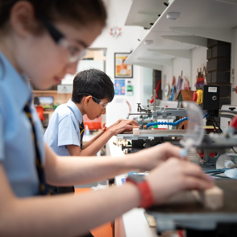 students working in the design room