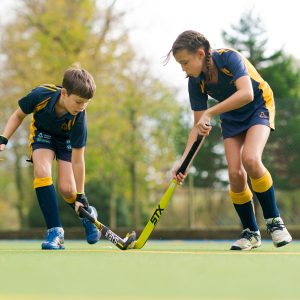 students playing hockey