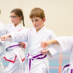 students practicing martial arts