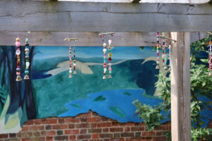 homemade wind chimes in the wellbeing garden