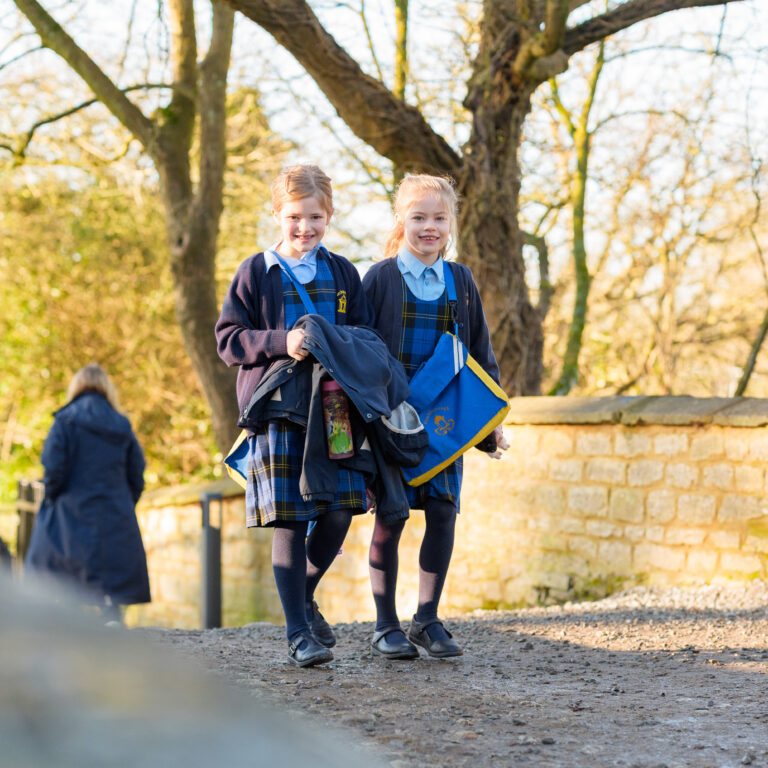 Girls walking into school Beachborough Prep near Buckingham