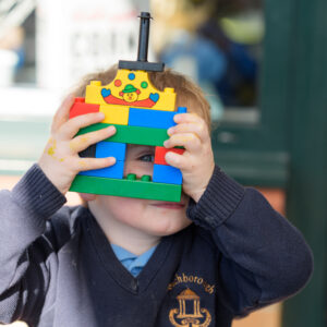 child using items to build at prep school near Buckingham