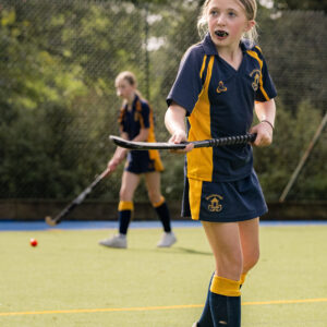 Girl playing hockey