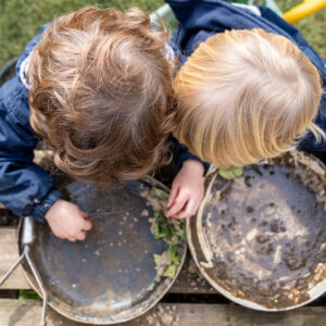 Making mud pies in the garden