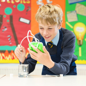 Boy in Beachborough science lesson using digital probe