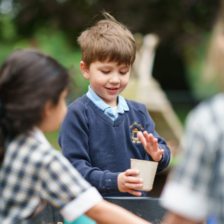 Enjoying outdoor play in Reception Class Brackley School